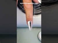 Optical illusion ombre french trend over natural nails. Black and white nails design. Vertical ombre
